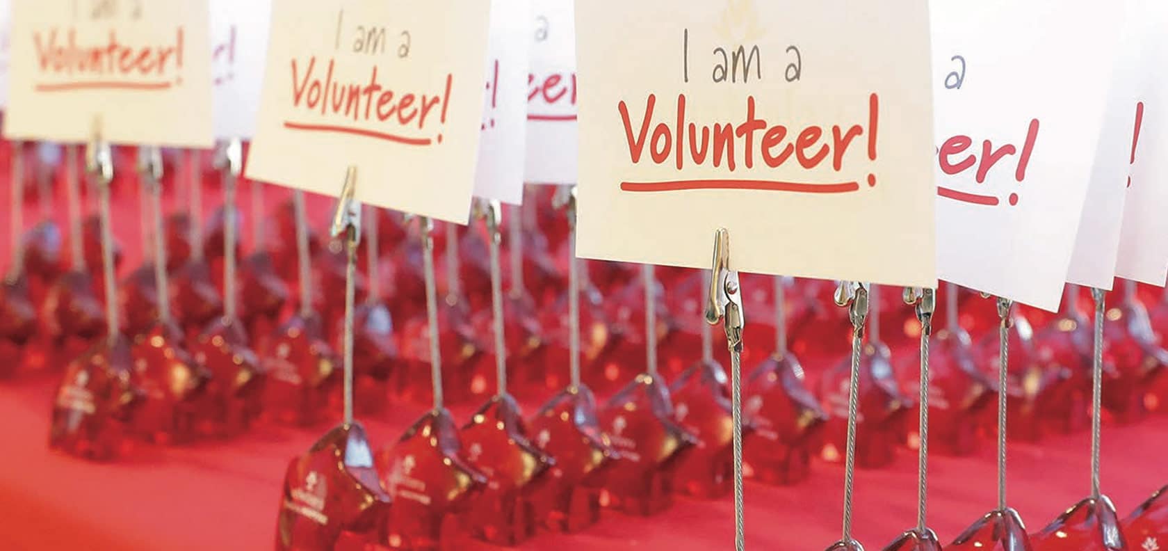 Volunteer signs for volunteers at Mapfre event.