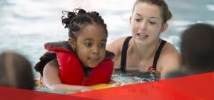 Water Safety Tips_Blog-Feature Illustration of a woman with a pet and a symbol of danger from a dog bite.